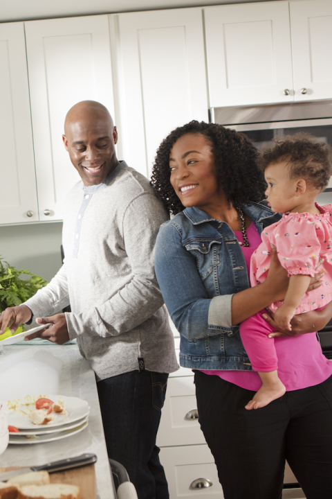 family doing dishes at home